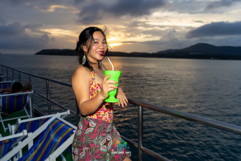 a-girl-enjoying-drink-in-boat